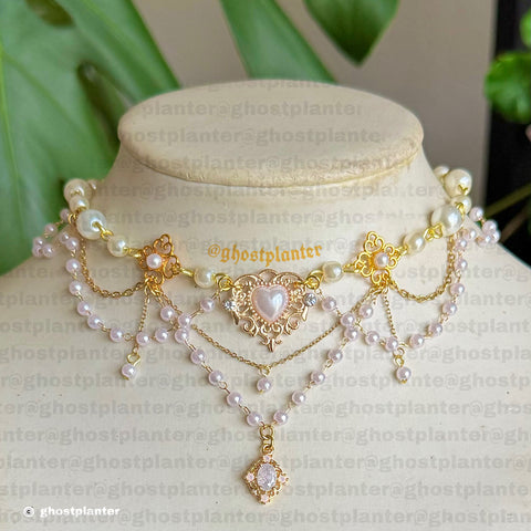 Golden Alloy Cottage Love Necklace
